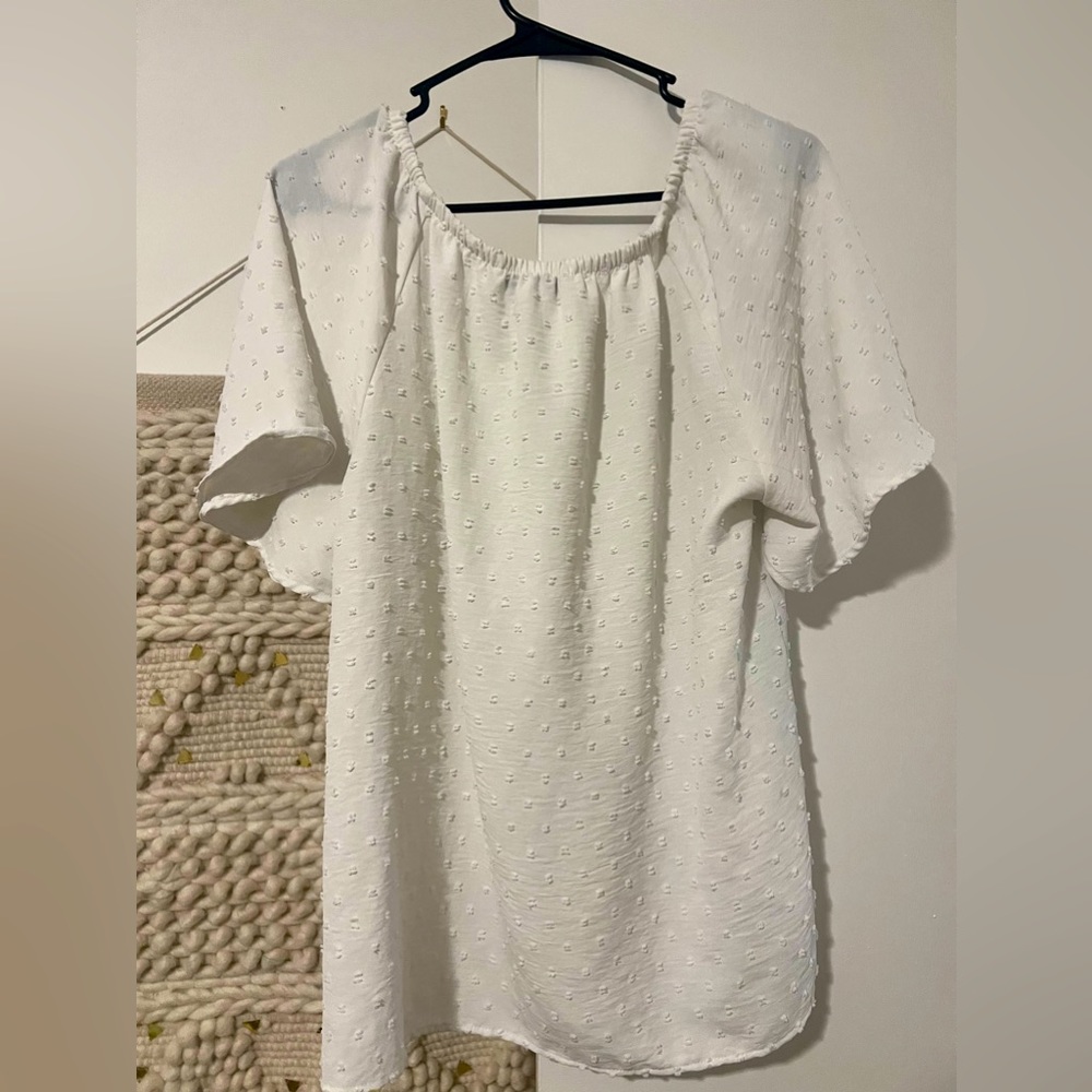 Large flowy white blouse.